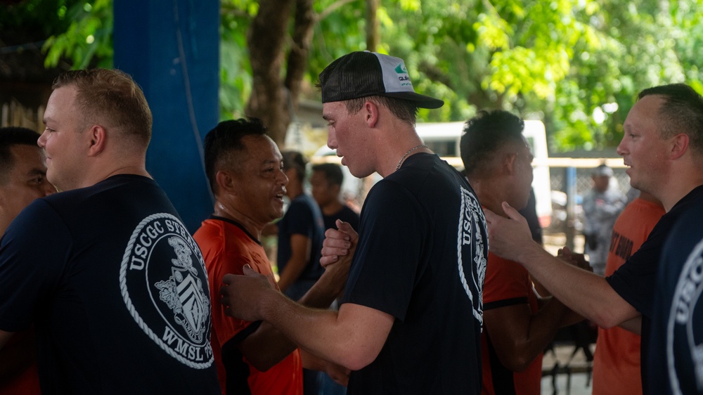 Members from the Legend-class USCGC Stratton compete in a game of basketball with Philippines Coast Guard in Puerto Princesa, Philippines