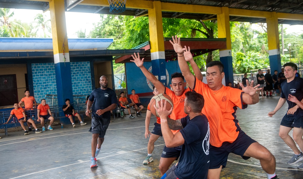 Members from the Legend-class USCGC Stratton compete in a game of basketball with Philippines Coast Guard in Puerto Princesa, Philippines