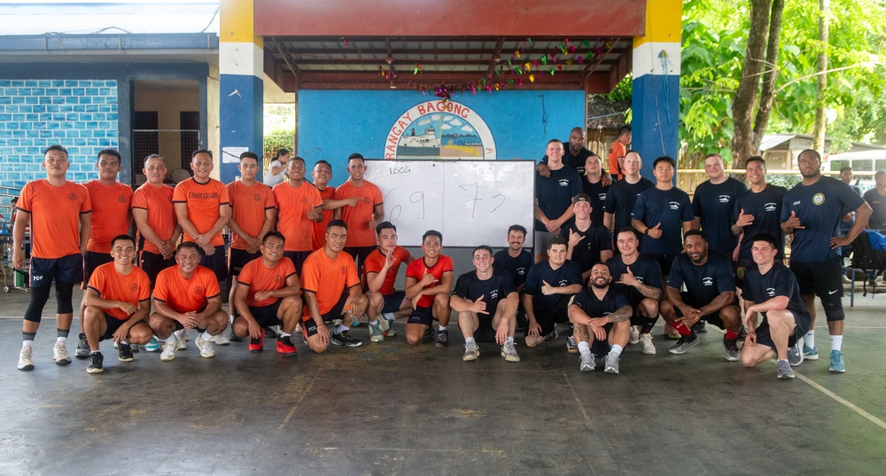 Members from the Legend-class USCGC Stratton compete in a game of basketball with Philippines Coast Guard in Puerto Princesa, Philippines