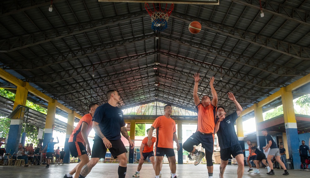 Members from the Legend-class USCGC Stratton compete in a game of basketball with Philippines Coast Guard in Puerto Princesa, Philippines