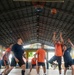 Members from the Legend-class USCGC Stratton compete in a game of basketball with Philippines Coast Guard in Puerto Princesa, Philippines