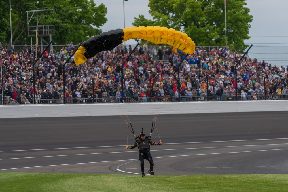 U.S. Army Parachute Team Soldier, an Indianapolis native, jumps ahead of Indy500
