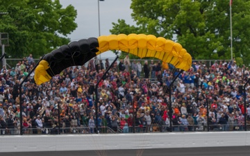 U.S. Army Parachute Team Soldier, an Indianapolis native, jumps ahead of Indy500