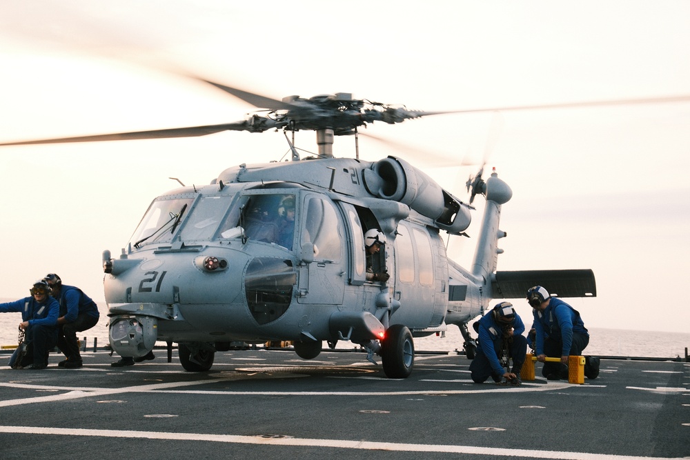 US Navy, US Coast Guard conduct integrated flight operations at sea aboard Coast Guard Cutter Hamilton