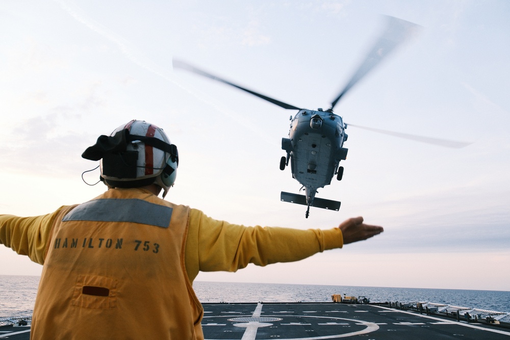 US Navy, US Coast Guard conduct integrated flight operations at sea aboard Coast Guard Cutter Hamilton