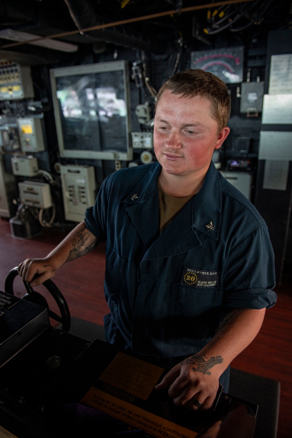 Sailor Mans the Helm