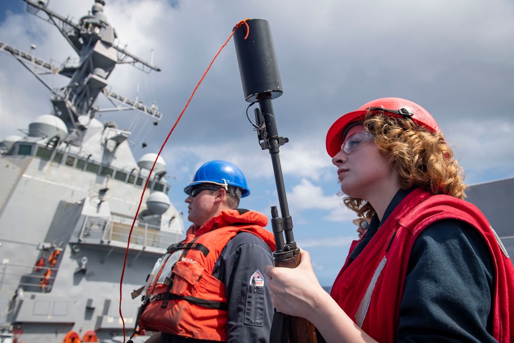 Sailor Readies Rifle