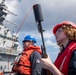 Sailor Readies Rifle
