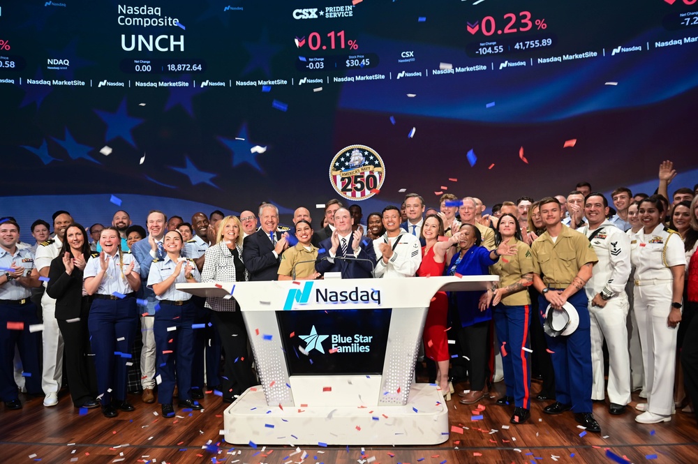 Service members of the U.S. Coast Guard,  Navy and Marine Corps ring the Nasdaq Opening Bell at the MarketSite in Times Square, officially marking the start of the trading day during Fleet Week New York 2025