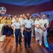 Service members of the U.S. Coast Guard,  Navy and Marine Corps ring the Nasdaq Opening Bell at the MarketSite in Times Square, officially marking the start of the trading day during Fleet Week New York 2025