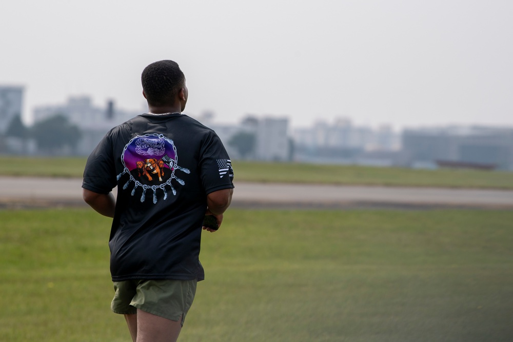 515 AMOG, 374 LRS honor the fallen during Port Dawg Rodeo