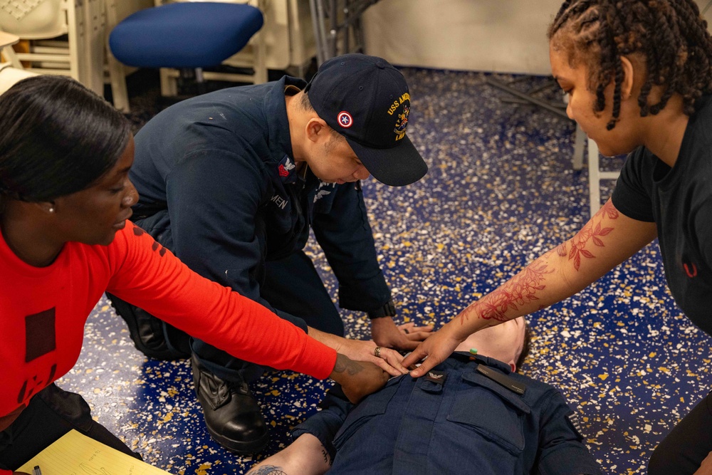 Sailors conduct Tactical Combat Casualty Care training aboard USS America (LHA 6)