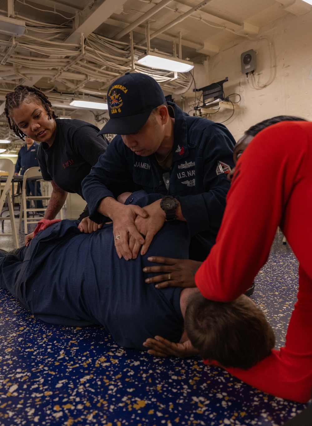 Sailors conduct Tactical Combat Casualty Care training aboard USS America (LHA 6)
