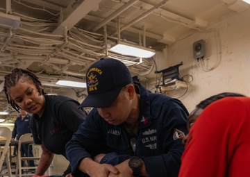 Sailors conduct Tactical Combat Casualty Care training aboard USS America (LHA 6)