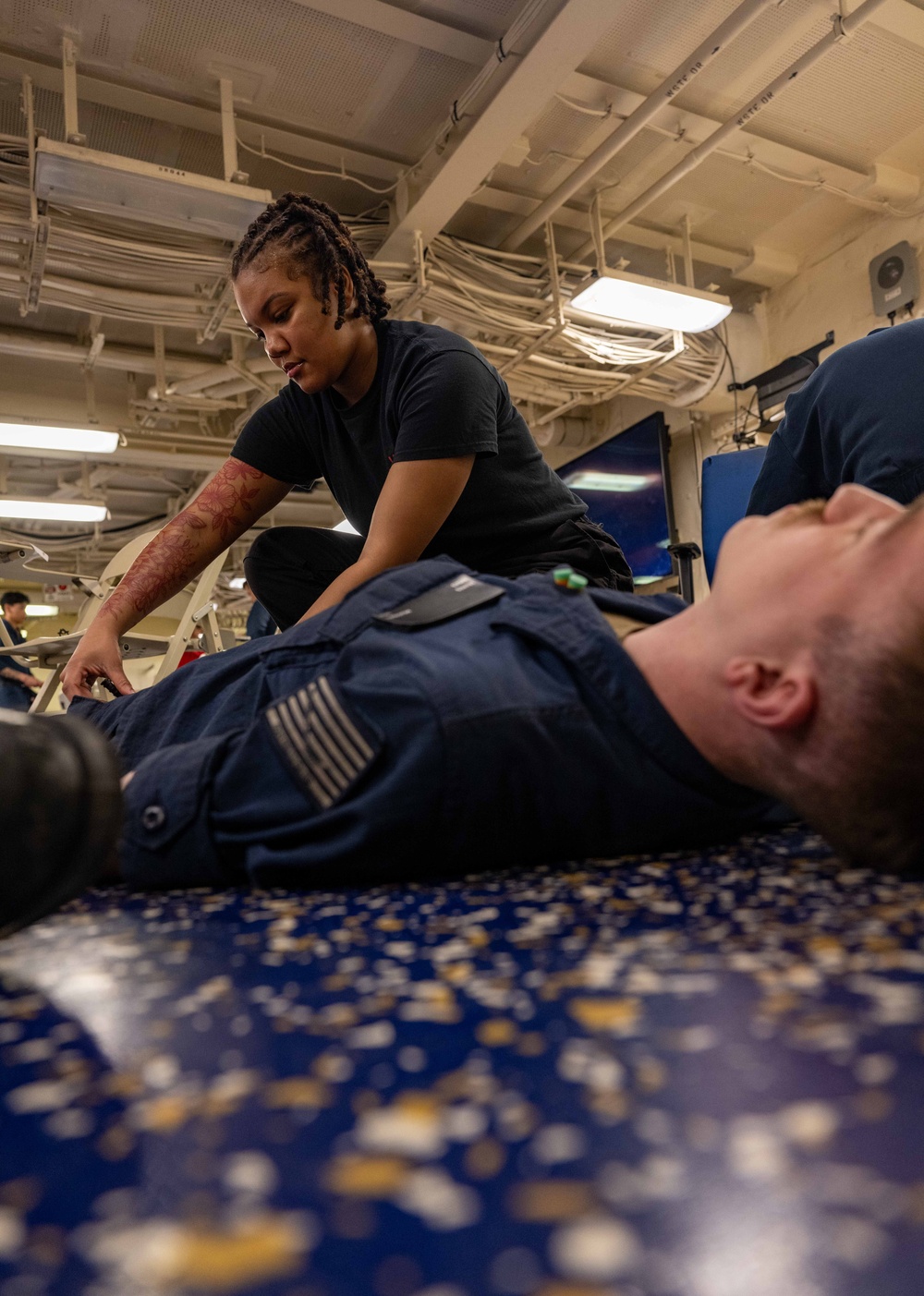 Sailors conduct Tactical Combat Casualty Care training aboard USS America (LHA 6)