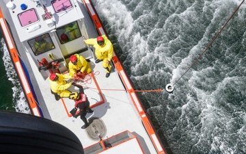Coast Guard Air Crew Demonstrates Life-Saving Techniques in Santa Barbara Exercise