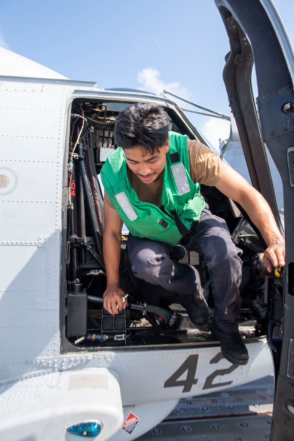Sailor Exits Helicopter
