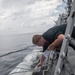 Sailor Conducts Maintenance
