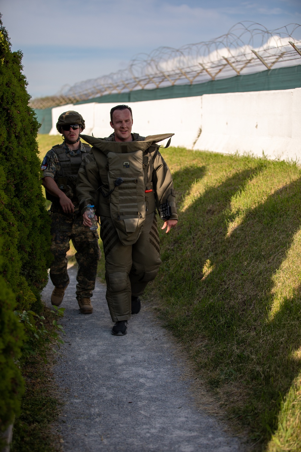 Multinational EOD Soldiers, assigned to the NATO-led KFOR mission, conduct Bomb Suit 5K