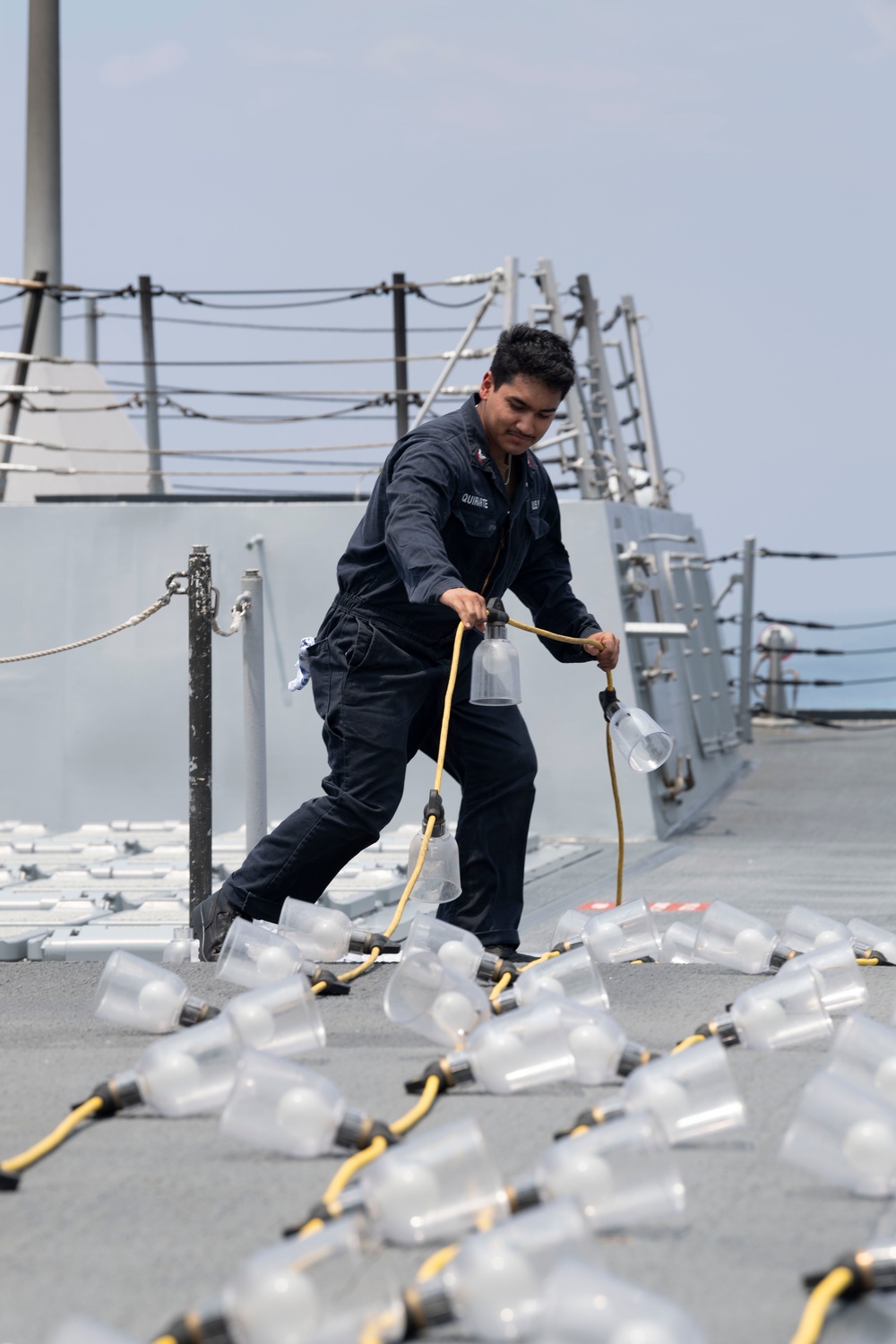 Sailor Inspects Equipment