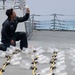 Sailor Inspects Equipment