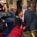 Sailor Demonstrates the Application of a Tourniquet