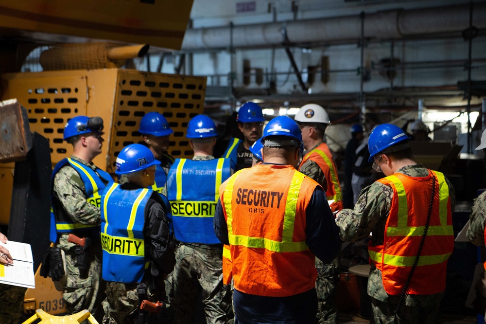 USS John C. Stennis (CVN 74) Sailors conduct Security Brief