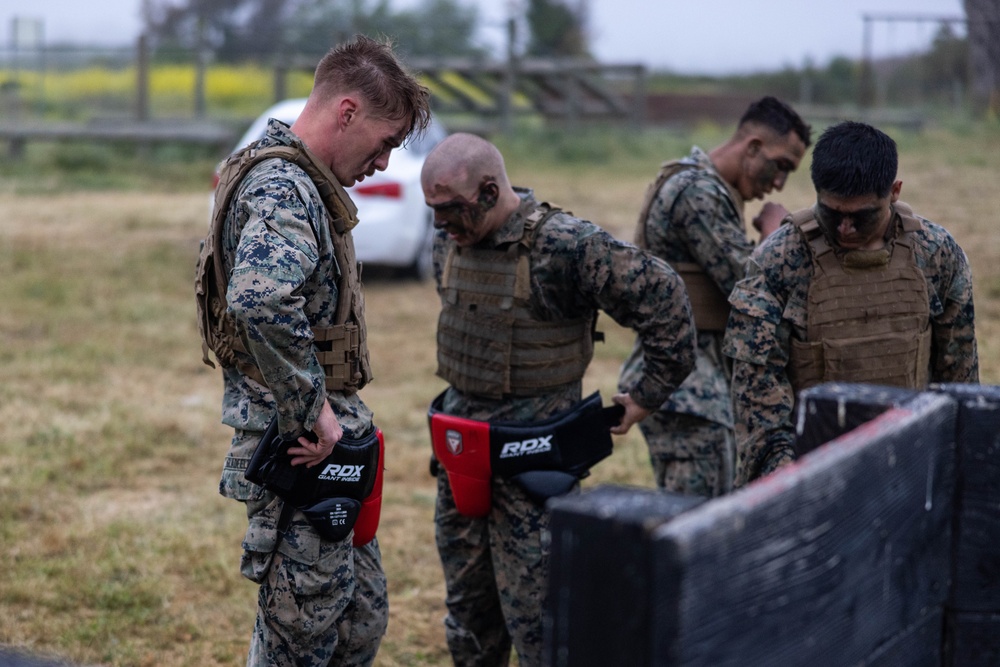 Marines with Martial Arts Instructor Course 79-25 participate in culminating event
