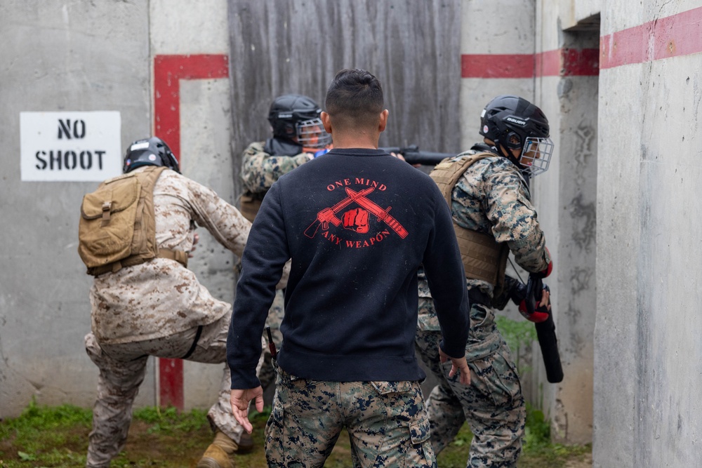Marines with Martial Arts Instructor Course 79-25 participate in culminating event