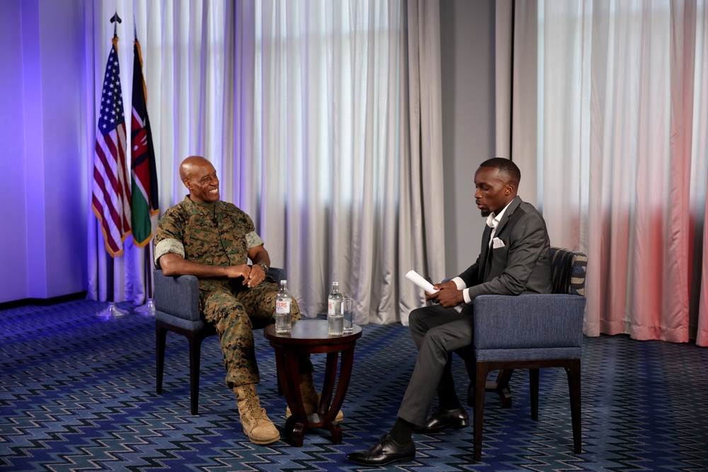 Gen. Michael Langley meets with a journalist during African Chiefs of Defense Conference 2025