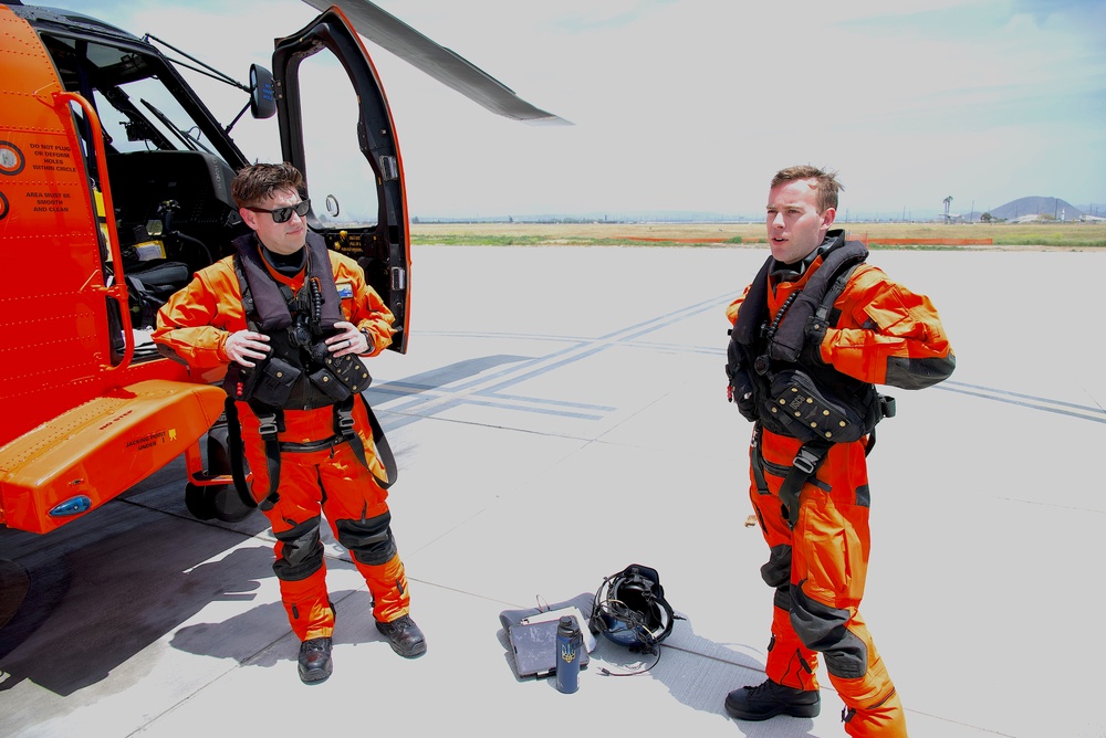 Coast Guard Air Station Ventura crew debriefs after SAR demo
