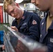 USS Preble Sailor Repairs Equipment