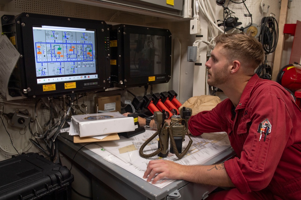 Sailor inspects system
