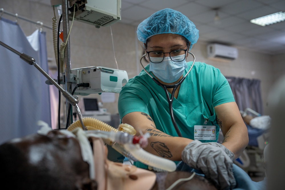 Respiratory technician takes care of patients in the ICU during African Lion 2025