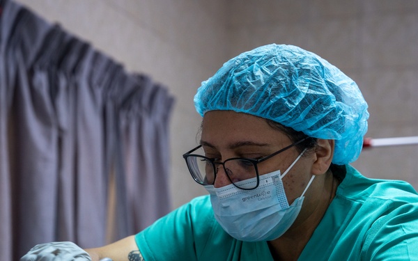 Respiratory technician takes care of patients in the ICU during African Lion 2025