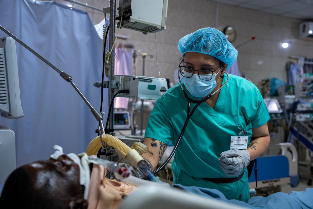 Respiratory technician takes care of patients in the ICU during African Lion 2025