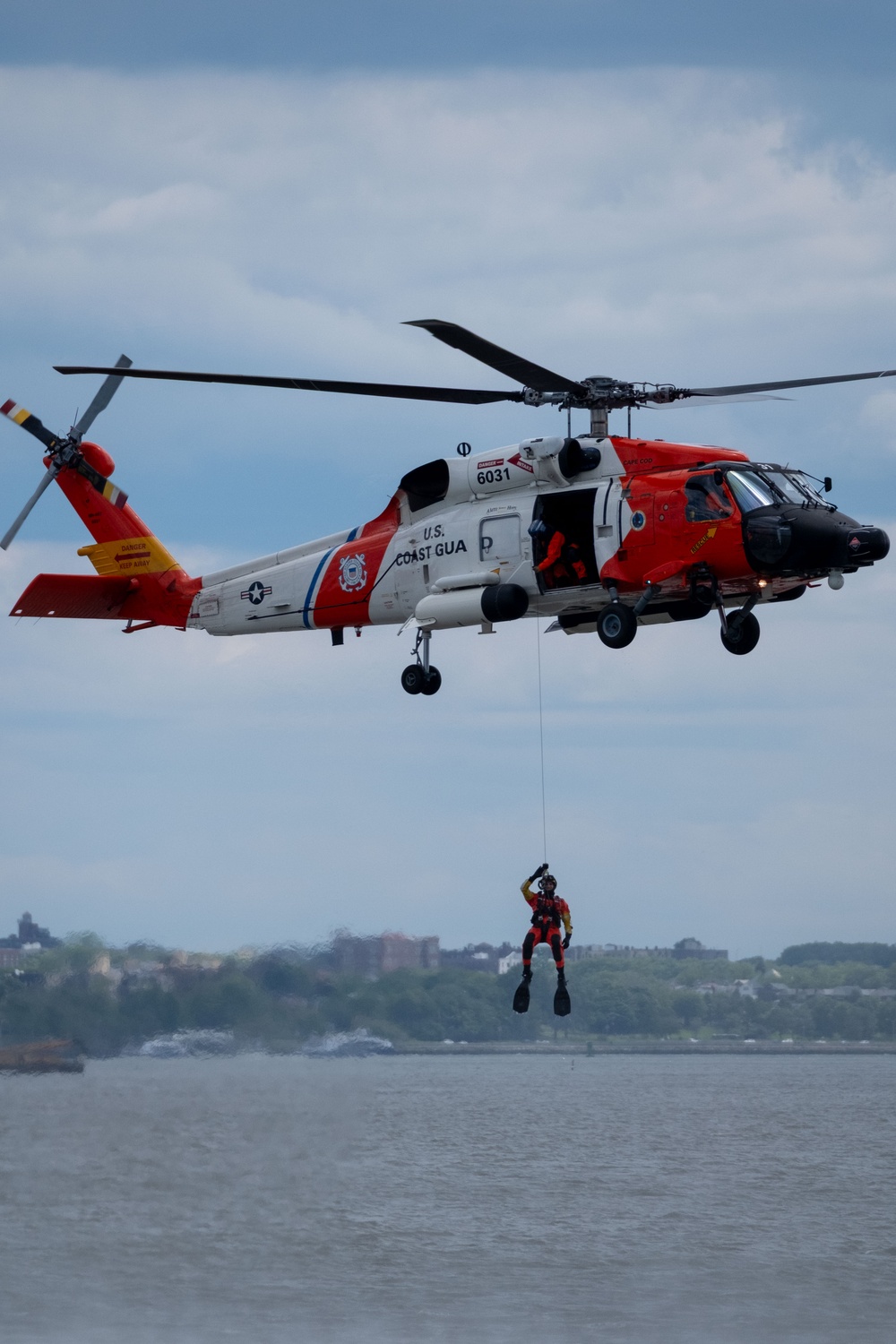 U.S. Coast Guard Air Station Cape Cod MH-60 Jayhawk conducts a search and rescue demonstration during Fleet Week NYC.