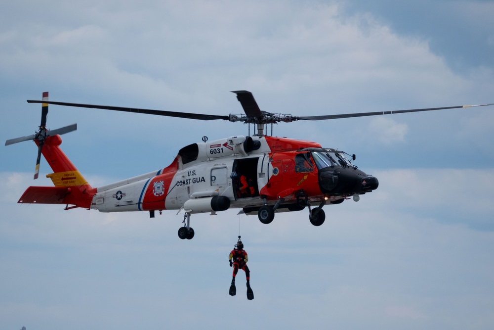 U.S. Coast Guard Air Station Cape Cod MH-60 Jayhawk conducts a search and rescue demonstration during Fleet Week NYC.