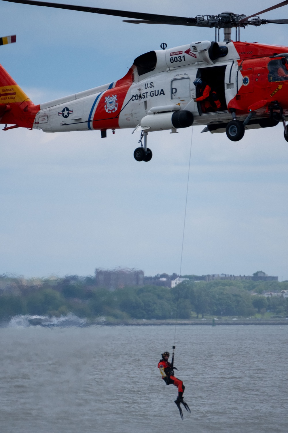 U.S. Coast Guard Air Station Cape Cod MH-60 Jayhawk conducts a search and rescue demonstration during Fleet Week NYC.