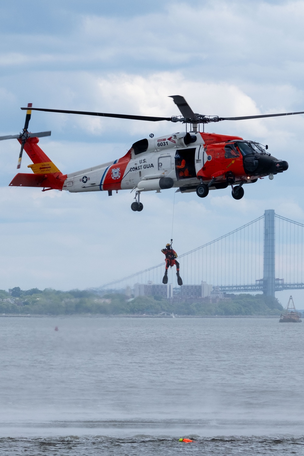 U.S. Coast Guard Air Station Cape Cod MH-60 Jayhawk conducts a search and rescue demonstration during Fleet Week NYC.