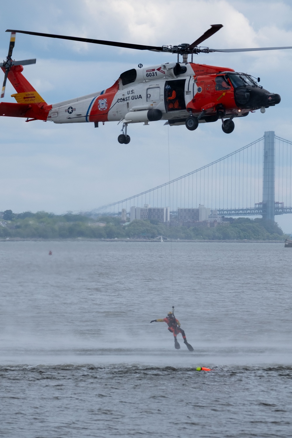 U.S. Coast Guard Air Station Cape Cod MH-60 Jayhawk conducts a search and rescue demonstration during Fleet Week NYC.