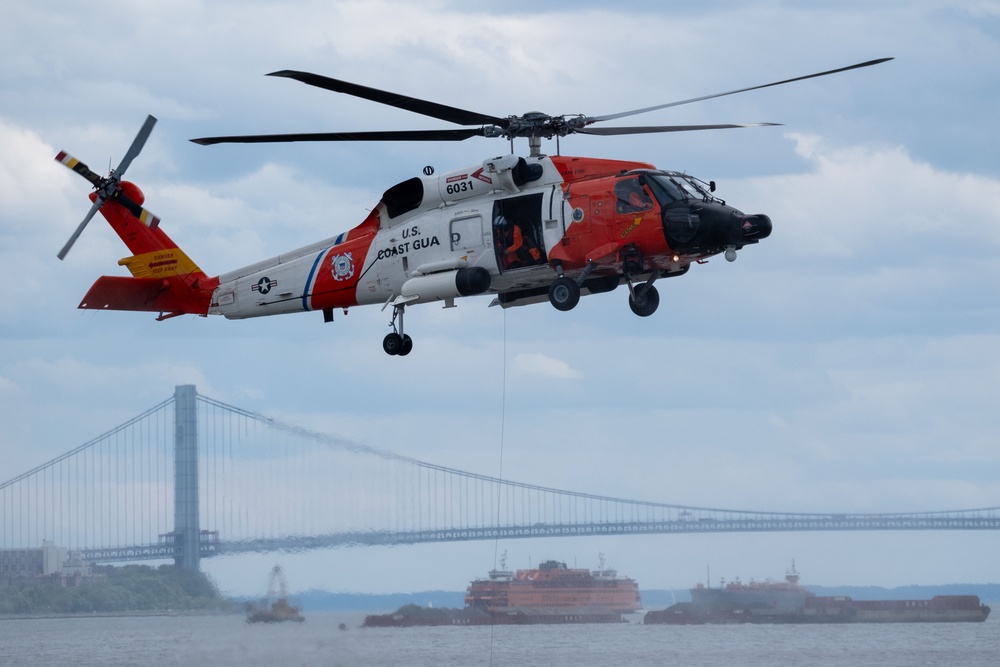 U.S. Coast Guard Air Station Cape Cod MH-60 Jayhawk conducts a search and rescue demonstration during Fleet Week NYC.