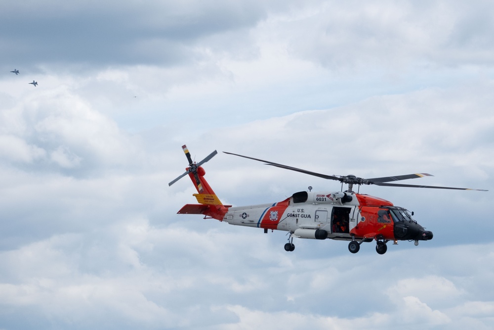 U.S. Coast Guard Air Station Cape Cod MH-60 Jayhawk conducts a search and rescue demonstration during Fleet Week NYC.
