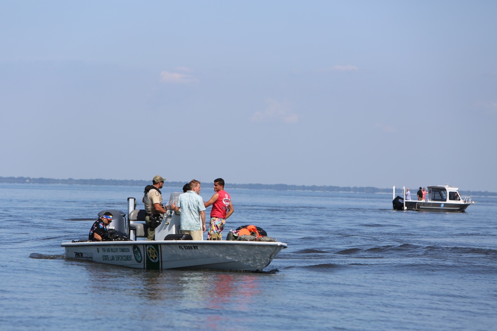 Army paratroopers conduct water jump into Lake Okeechobee