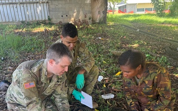 Service members conduct G6PD field testing as part of the disease surveillance efforts at No Sick Soljia 2025 in Wewak, Papua New Guinea.