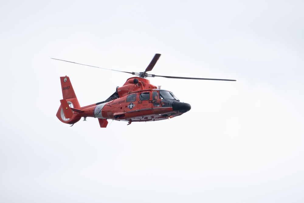 U.S. Coast Guard MH-65 dolphin conducts a search and rescue demonstration off the Homeport Pier in Staten Island during Fleet Week NYC 2025.
