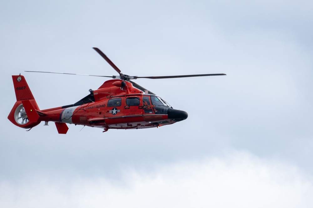 U.S. Coast Guard MH-65 dolphin conducts a search and rescue demonstration off the Homeport Pier in Staten Island during Fleet Week NYC 2025.