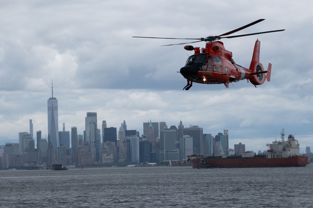 U.S. Coast Guard MH-65 dolphin conducts a search and rescue demonstration off the Homeport Pier in Staten Island during Fleet Week NYC 2025.