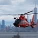 U.S. Coast Guard MH-65 dolphin conducts a search and rescue demonstration off the Homeport Pier in Staten Island during Fleet Week NYC 2025.