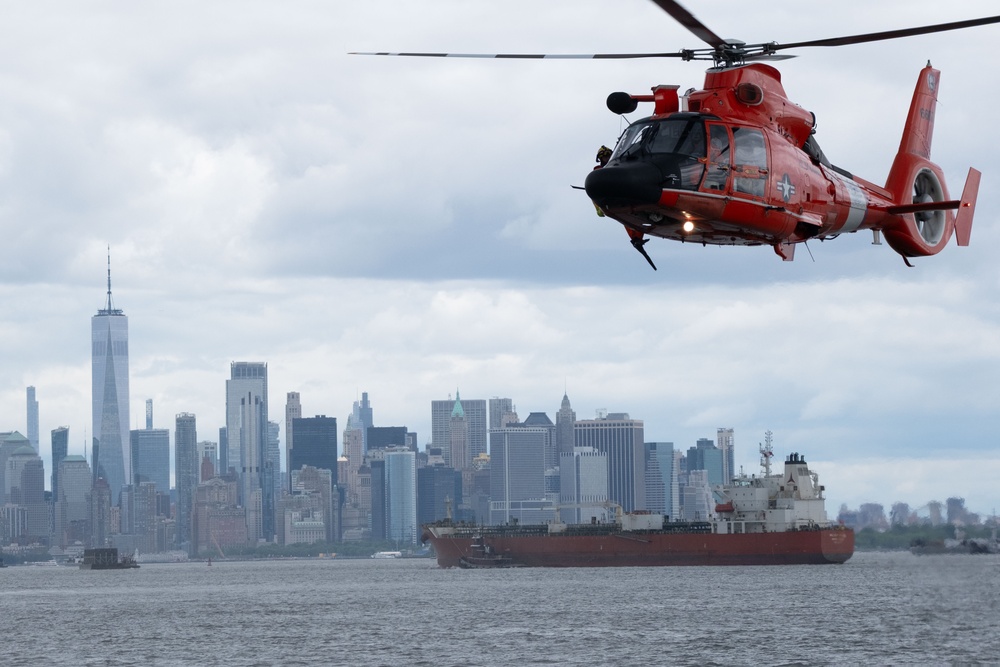 U.S. Coast Guard MH-65 dolphin conducts a search and rescue demonstration off the Homeport Pier in Staten Island during Fleet Week NYC 2025.